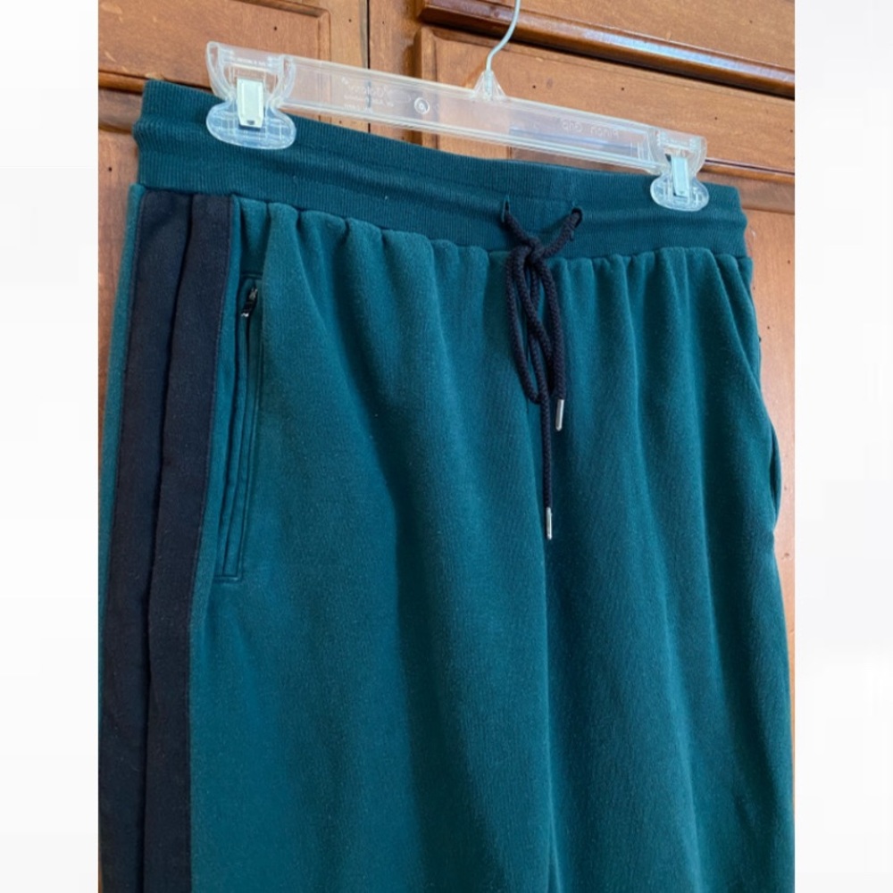 Green and black zipper detailed sweatpants